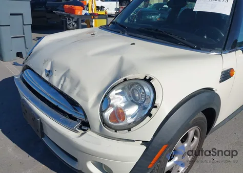 2009 Mini Cooper z USA, uszkodzony, nr VIN WMWMF33559TW77899